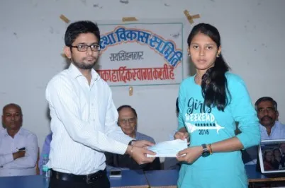 A student receives a scholarship