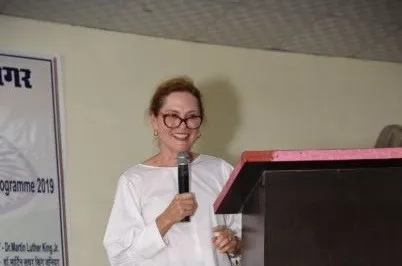 Amy Hawkins speaks to students and families