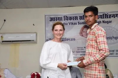 A student receives a scholarship