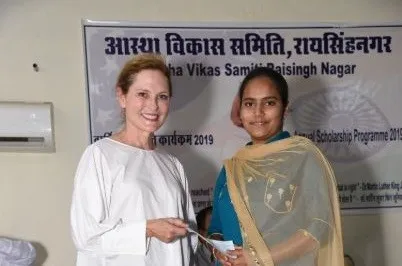 A student receives a scholarship