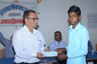 A student receives a scholarship