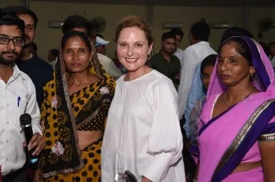 Amy Hawkins with mothers of sponsored children